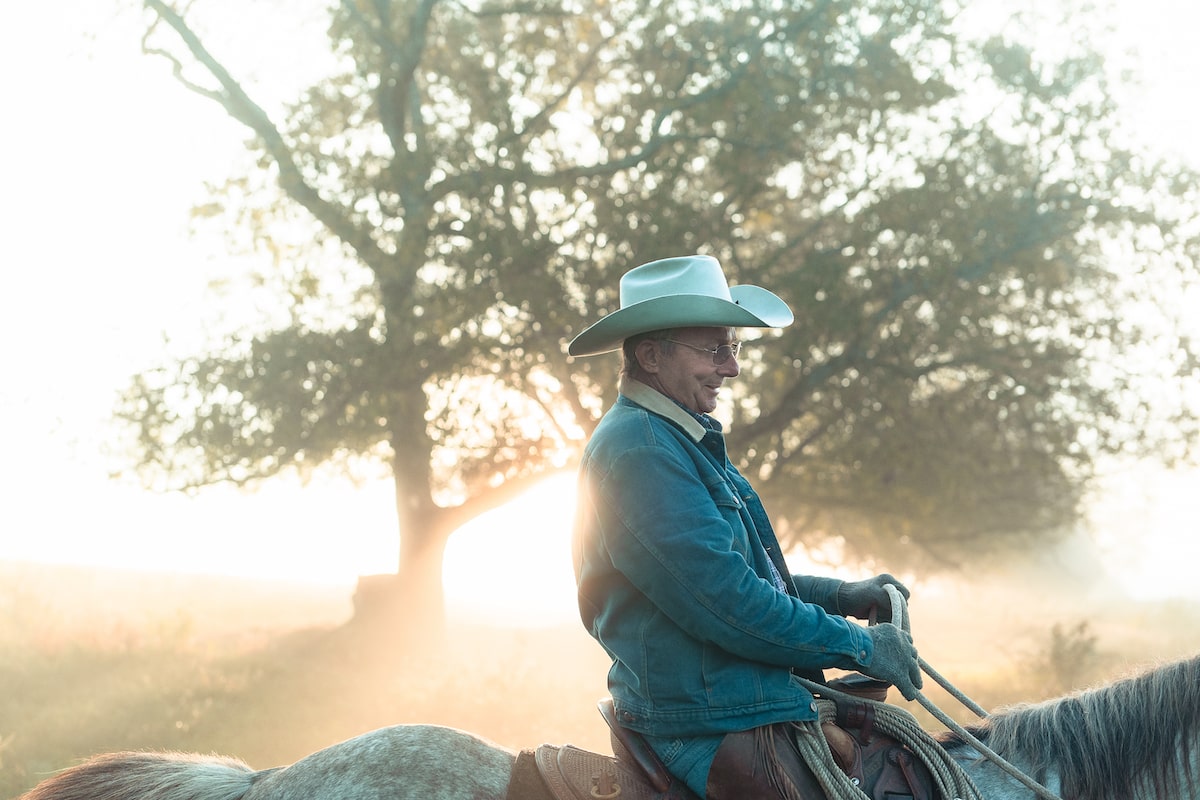 cowboy riding horse